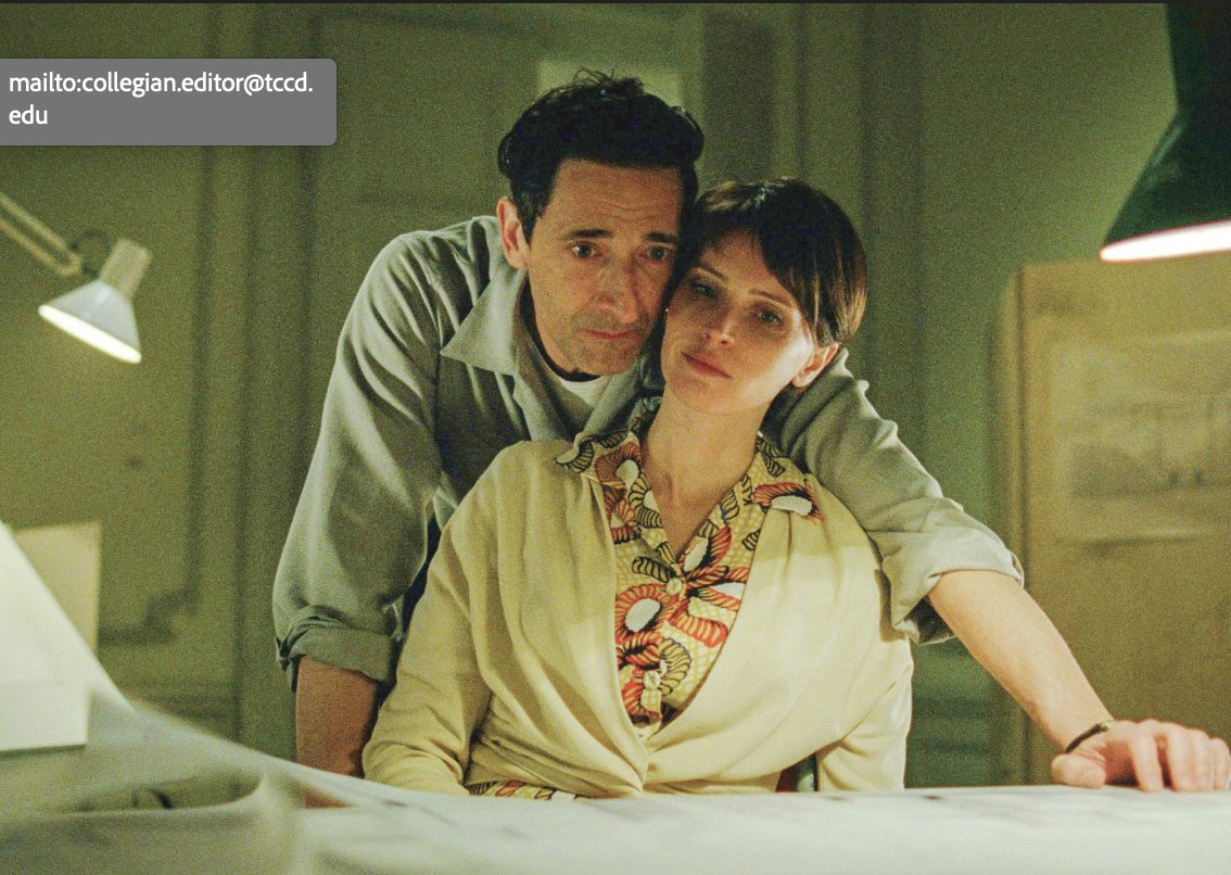 Adrien Brody, left, and Felicity Jones share a contemplative moment in a scene from “The Brutalist.”